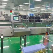 Convoyeur d'ampoules pharmaceutiques